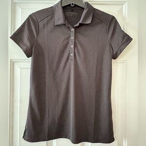 Nike Golf Dri Fit black short sleeve polo shirt. Size medium.